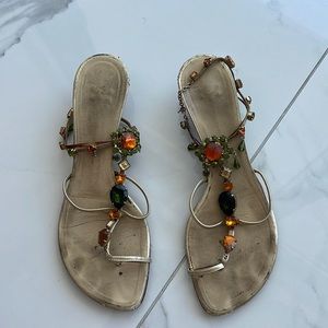 Guiseppe Zanotti Design jeweled sandals.